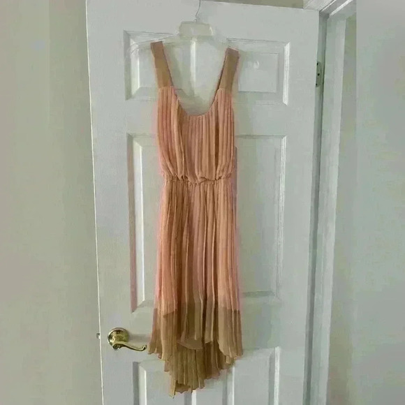 Jessica Simpson-Light apricot color on top, tan on bottom. - Picture 1 of 6